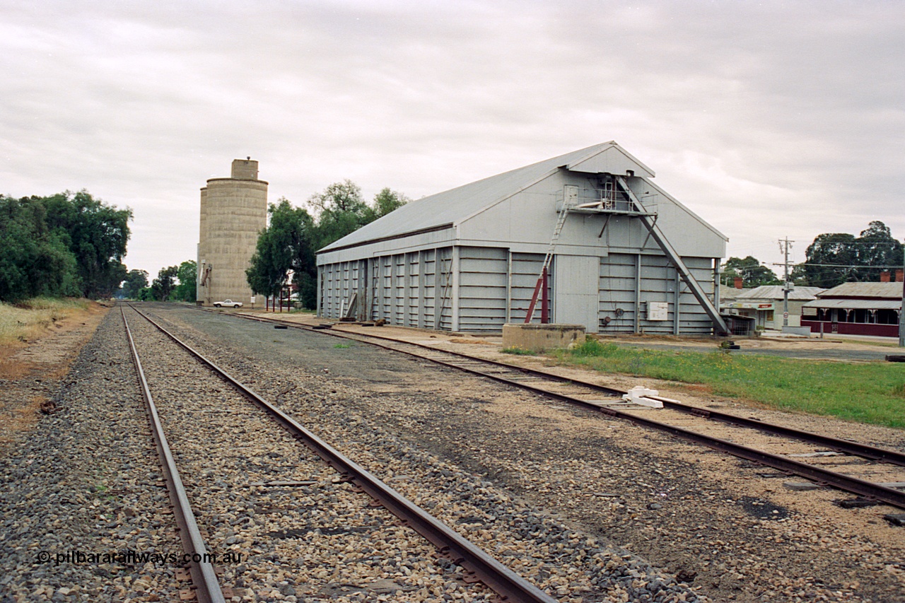 170-14
Devenish station yard overview looking north towards Oaklands, Victorian Oat Pool horizontal bunker, Williamstown style silo complex in the distance.
