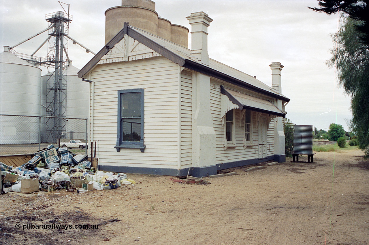 170-18
Goorambat, rear view of station building from car park, view across yard of Ascom and Williamstown style silo complexes.
