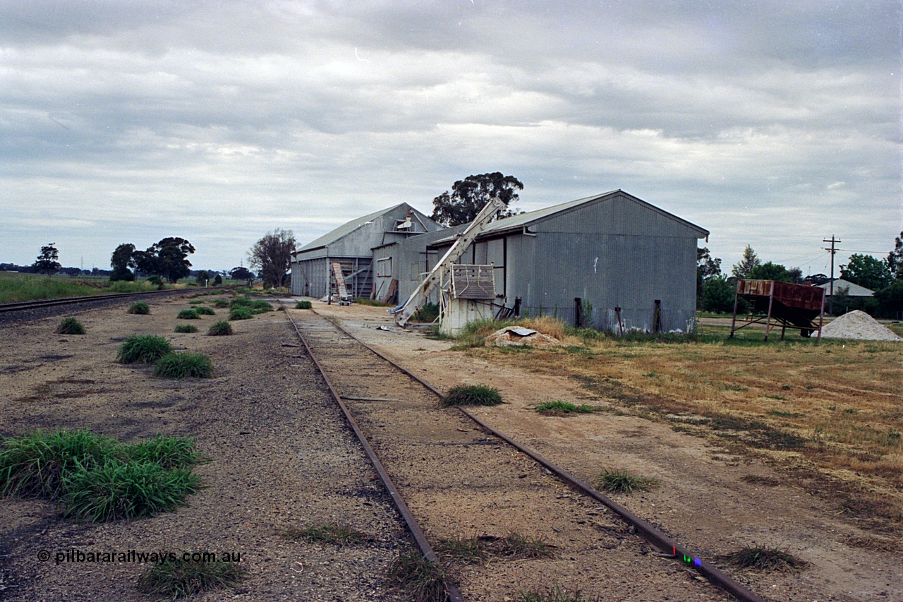 170-20
Goorambat, yard view looking towards Benalla, super phosphate sheds with a Victorian Oat Pool shed beyond them.
