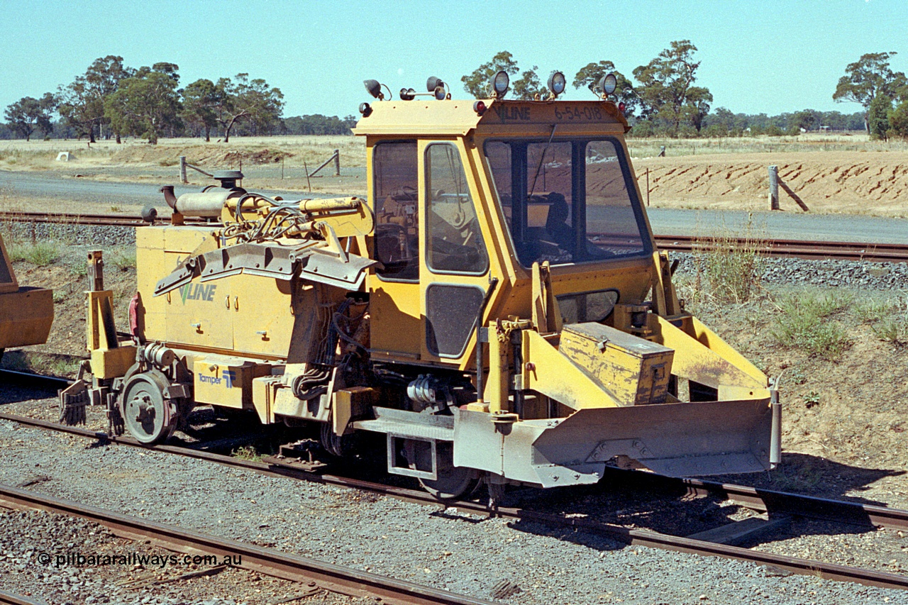 173-08
Murchison East, V/Line broad gauge track machine, asset no. 6-54-018, which is a Tamper BE VR ballast regulator.
Keywords: Tamper;BE-VR;6-54-018;track-machine;
