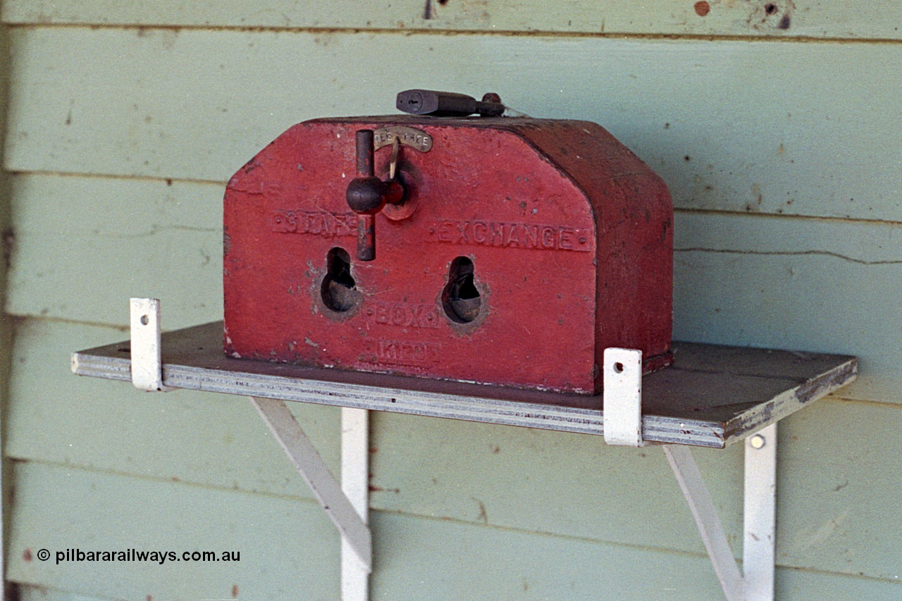 173-12
Murchison East, station platform, staff exchange box, mounted above staff box on station wall.
