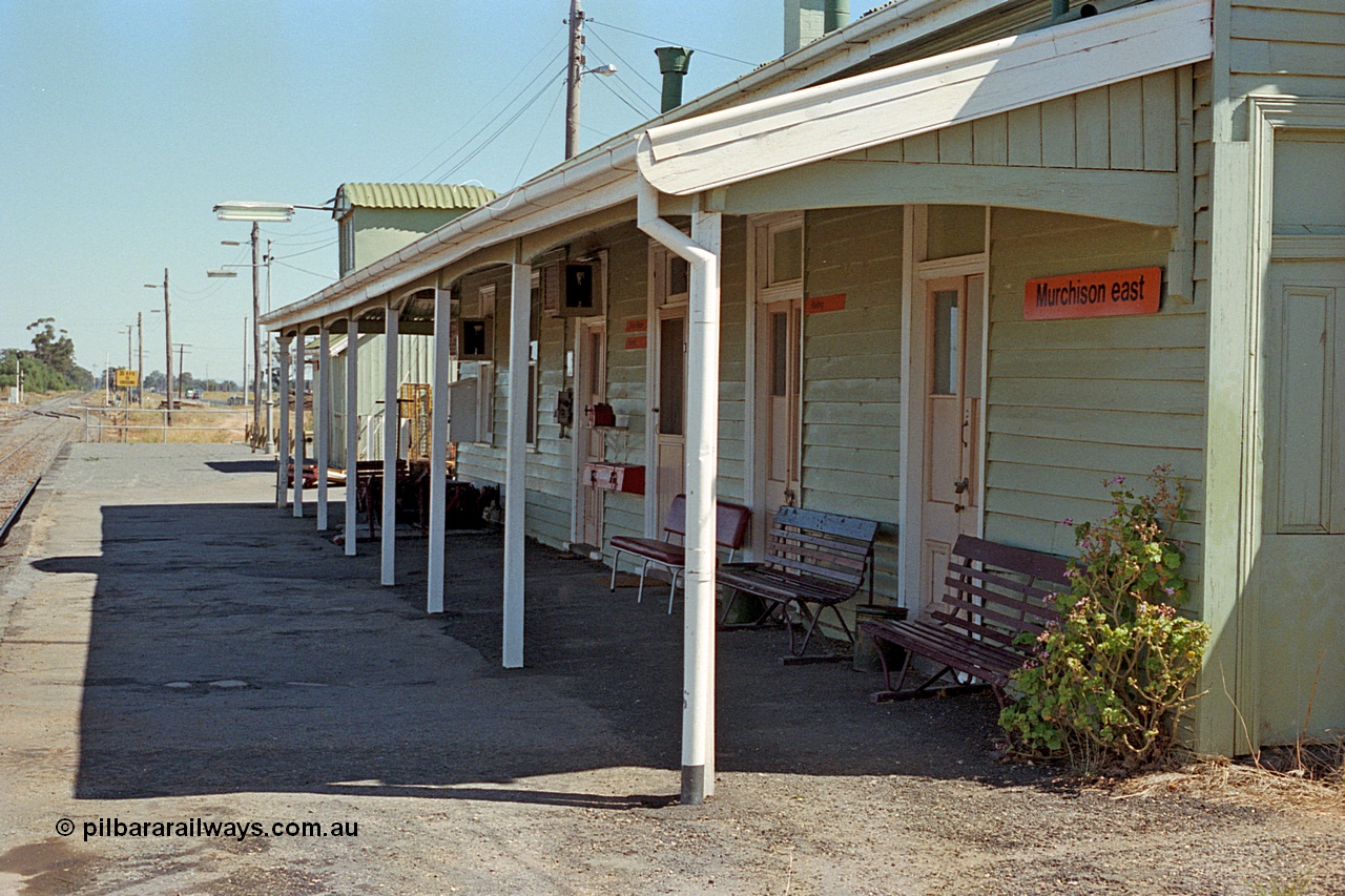 173-13
Murchison East, station building and platform view looking towards Melbourne, staff exchange box is visible on the wall.
