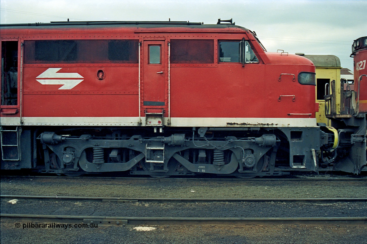 174-14
Albury loco depot, fuel point area, NSWSRA standard gauge 44 class 4456 AE Goodwin ALCo model DL500B serial 83746 in Red Terror livery, cab side shot.
Keywords: 44-class;4456;AE-Goodwin;ALCo;DL500B;83746;