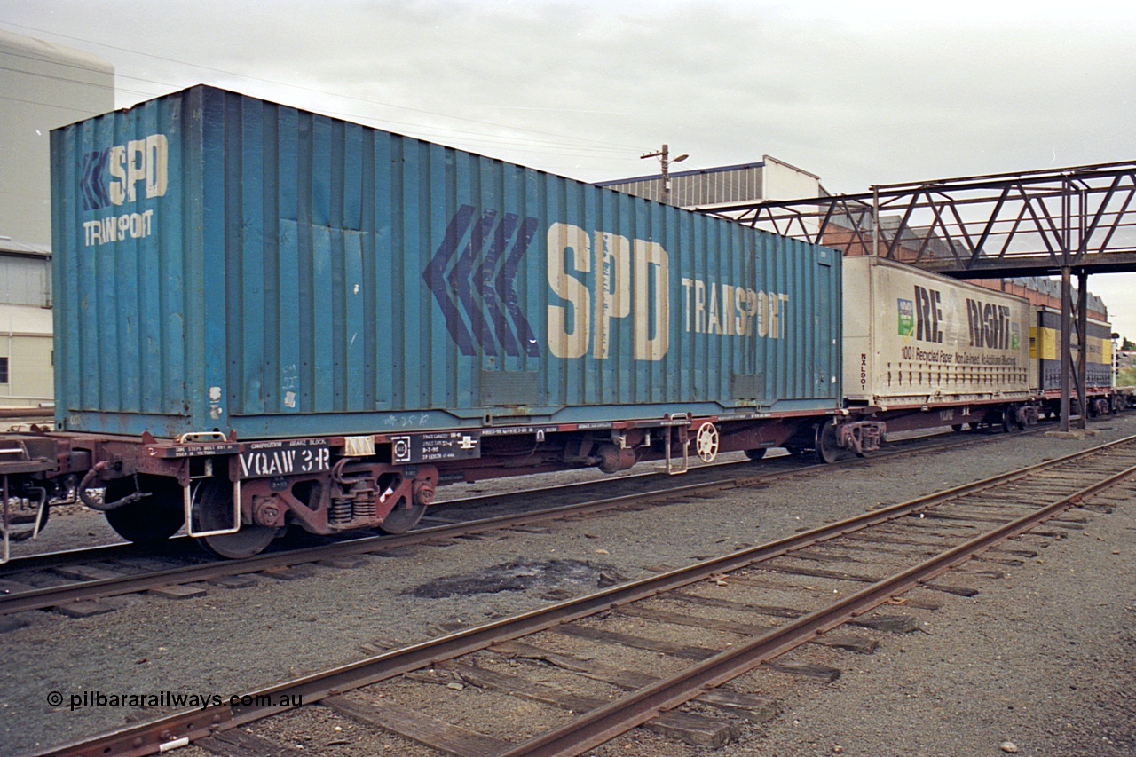 174-16
Albury, yard view looking north, V/Line standard gauge VQAW type VQAW 3, three pack articulated container waggon built by V/Line Ballarat North Workshops and issued to traffic 21-03-1990, loaded with three 40' containers on a south bound goods train.
Keywords: VQAW-type;VQAW3;V/Line-Ballarat-Nth-WS;