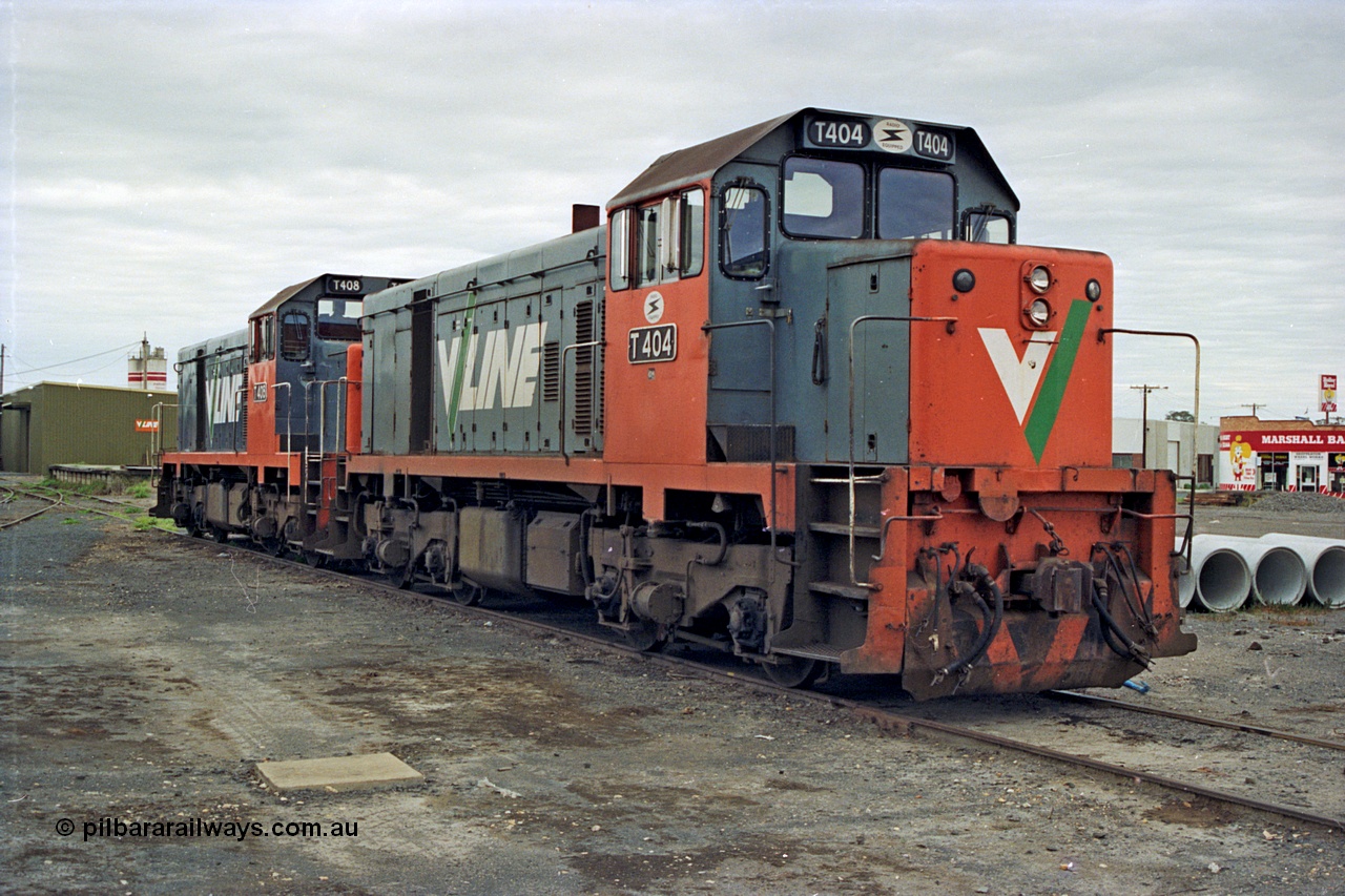 175-01
Shepparton, yard view with V/Line broad gauge T class locomotives T 404 Clyde Engineering EMD model G18B serial 67-499 and T 408 serial 68-624 stabled in the yard.
Keywords: T-class;T404;Clyde-Engineering-Granville-NSW;EMD;G18B;67-499;