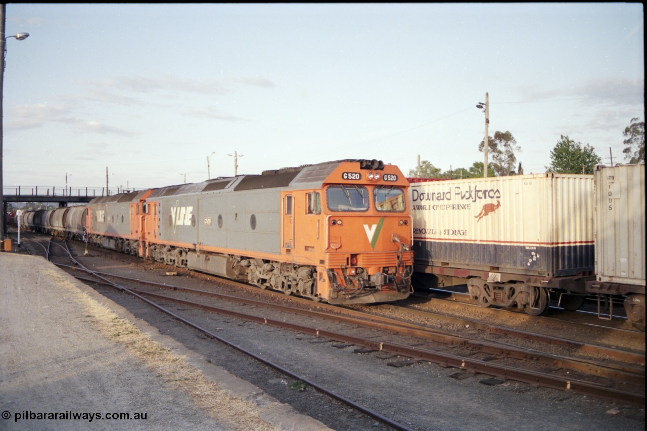 176-19
Albury, a pair of V/Line standard gauge G class units, lead by G 520 Clyde Engineering EMD model JT26C-2SS serial 85-1233 bring an up goods train bound for Melbourne into the platform for a crew change.
Keywords: G-class;G520;Clyde-Engineering-Rosewater-SA;EMD;JT26C-2SS;85-1233;