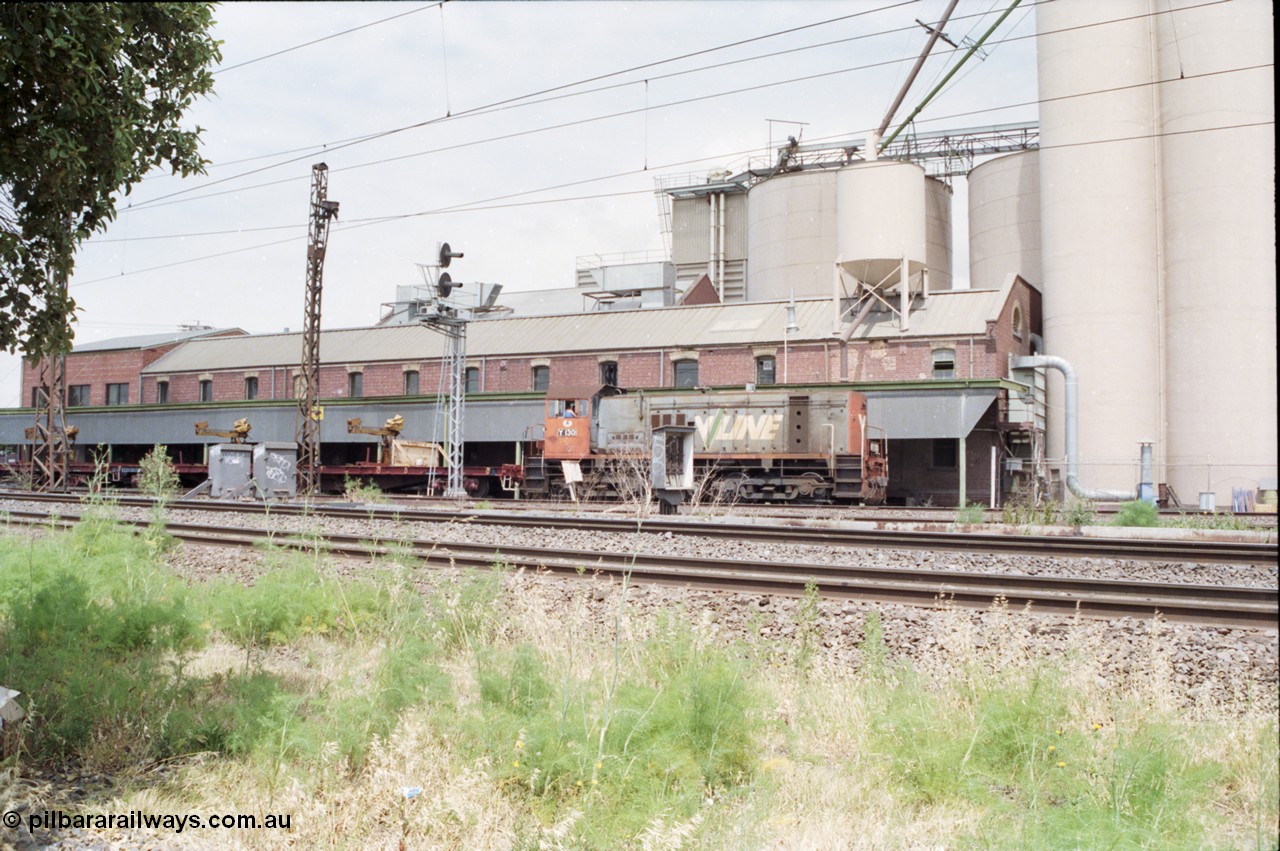 177-08
Newport Junction, V/Line broad gauge shunt locomotive Y class Y 130 Clyde Engineering EMD model G6B serial 65-396 leads a rail recovery train of VZRF class bogie welded rail transport waggons, along the Newport - Sunshine Loop Line in front of the Victorian Oatgrowers Pool Siding.
Keywords: Y-class;Y130;Clyde-Engineering-Granville-NSW;EMD;G6B;65-396;
