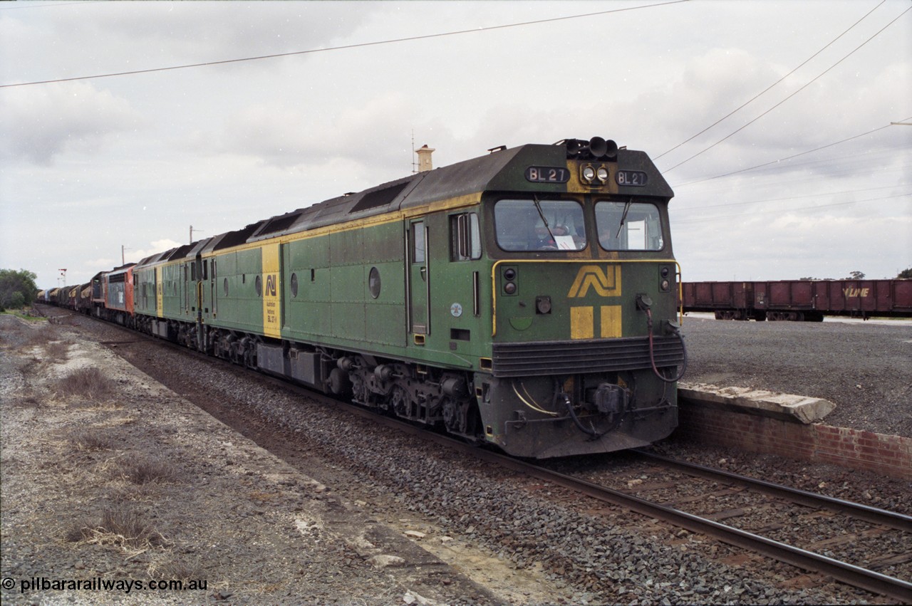177-19
Gheringhap, down V/Line broad gauge goods train to Adelaide 9169 with the quad power combo of a pair of Australian National BL class locomotives BL 27 Clyde Engineering EMD model JT26C-2SS serial 83-1011 and class leader BL 26 'Bob Hawke' serial 83-1010 and V/Line S class S 313 'Alfred Deakin' Clyde Engineering EMD model A7 serial 61-230 and X class X 53 Clyde Engineering EMD model G26C serial 75-800, BL 27 had Paul Keating drawn on the LHS cab as it was just after he'd taken the Labor Party leadership and the Prime Ministership off Bob Hawke.
Keywords: BL-class;BL27;Clyde-Engineering-Rosewater-SA;EMD;JT26C-2SS;83-1011;