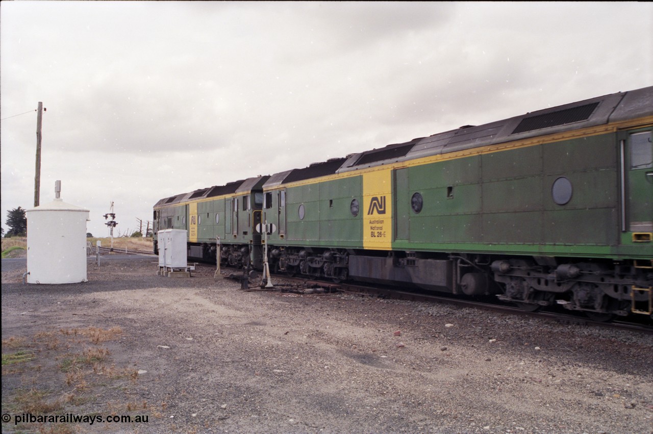 178-04
Cressy, down V/Line broad gauge goods train to Adelaide 9169 powers through the trailable points at the western end of the loop heading towards Ararat, Australian National BL class locomotives BL 27 Clyde Engineering EMD model JT26C-2SS serial 83-1011 and class leader BL 26 'Bob Hawke' serial 83-1010, BL 27 had Paul Keating drawn on the LHS cab as it was just after he'd taken the Labor Party leadership and the Prime Ministership off Bob Hawke.
