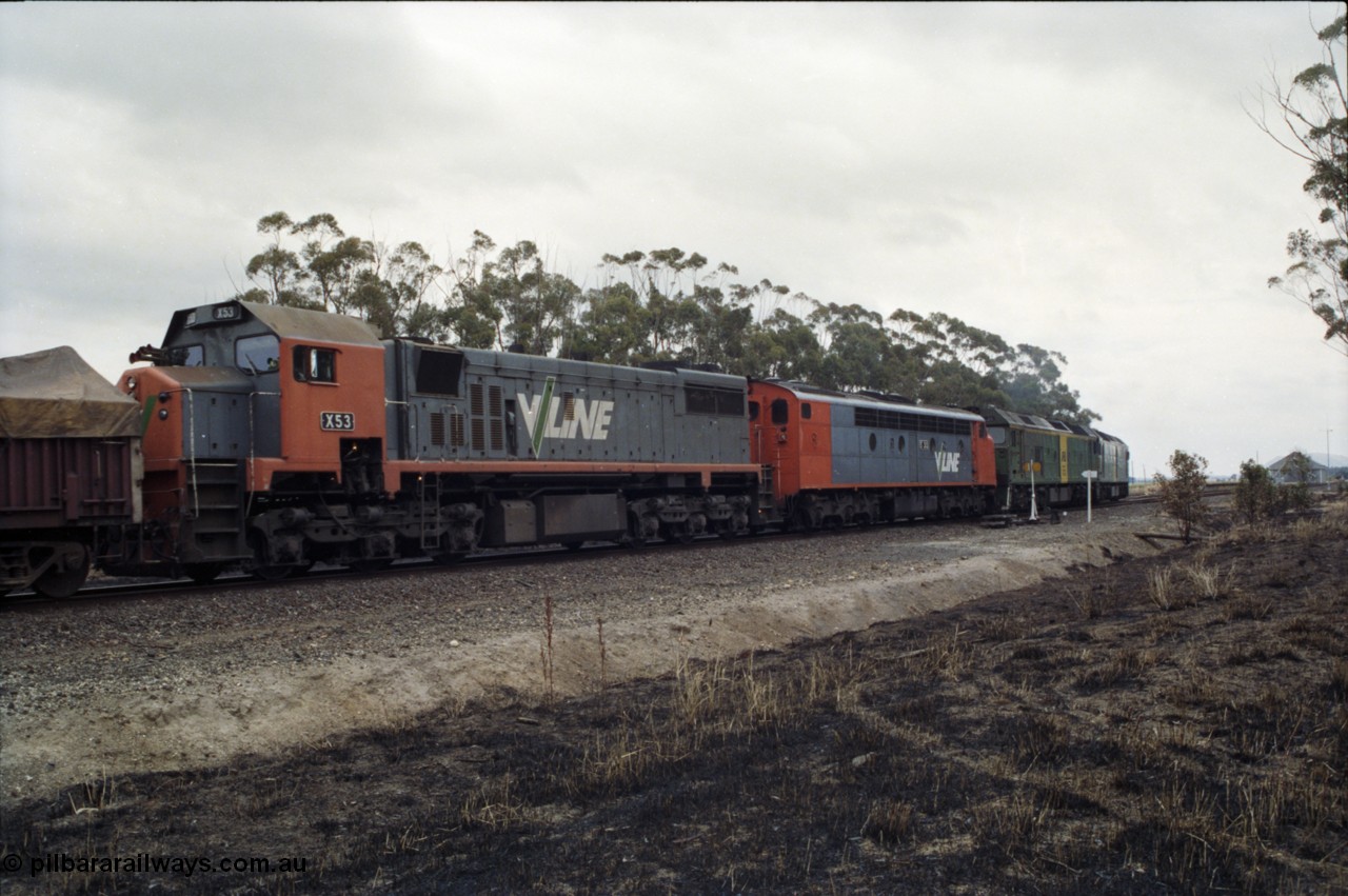 178-07
Lismore, V/Line broad gauge 9169 goods train to Adelaide powers into the loop heading for Ararat with the quad combo of a pair of Australian National BL class locomotives BL 27 Clyde Engineering EMD model JT26C-2SS serial 83-1011 and class leader BL 26 'Bob Hawke' serial 83-1010 and V/Line S class S 313 'Alfred Deakin' Clyde Engineering EMD model A7 serial 61-230 and V/Line X class loco X 53 with serial 75-800 a Clyde Engineering Rosewater SA built EMD model G26C.
Keywords: X-class;X53;Clyde-Engineering-Rosewater-SA;EMD;G26C;75-800;