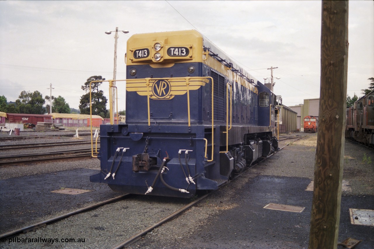 178-21
Ballarat East loco depot, former Australian Portland Cement loco, then bought by Victorian Railways and the only T class with a dynamic brake, T 413 'Wesley B. Mc Cann' Clyde Engineering EMD model G8B serial 56-107, long hood view.
Keywords: T-class;T413;Clyde-Engineering-Granville-NSW;EMD;G8B;56-107;