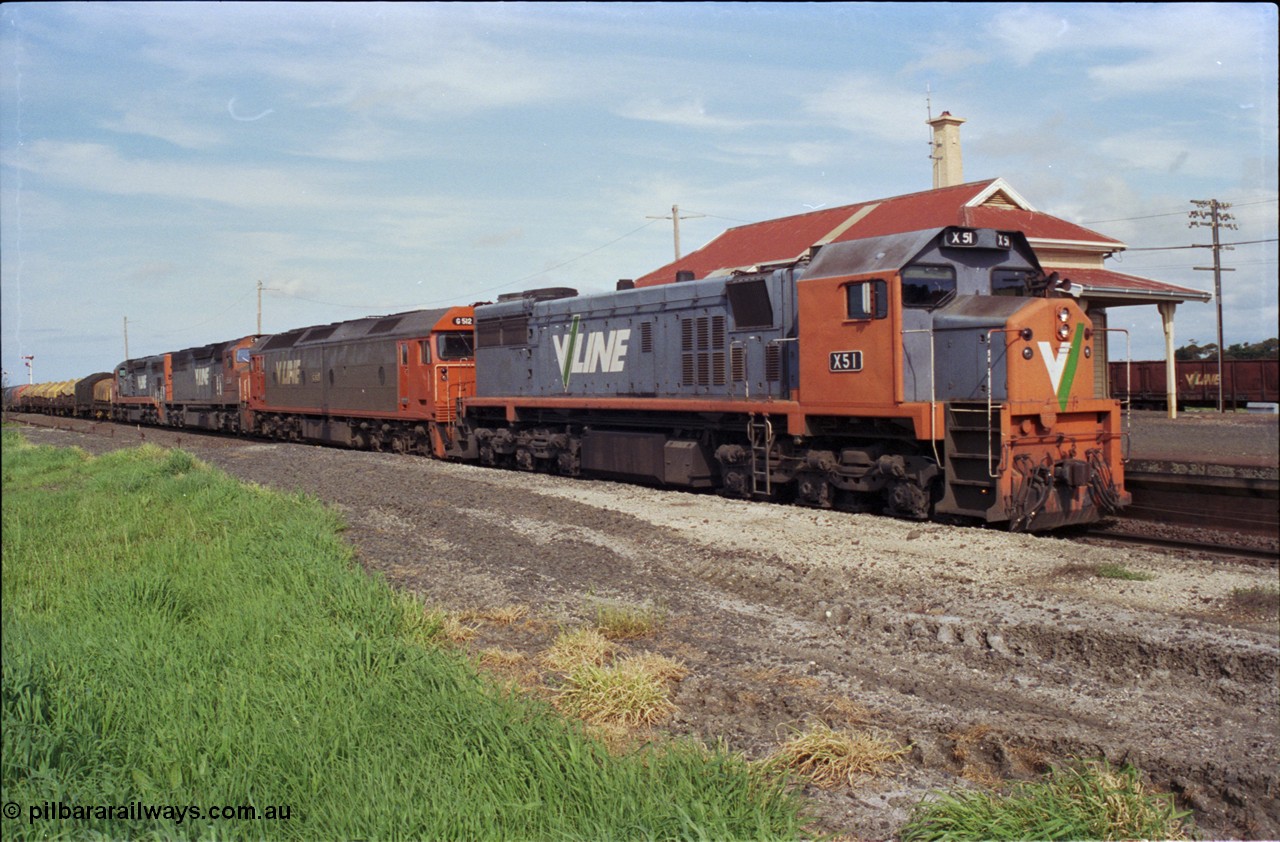 179-14
Gheringhap, V/Line broad gauge X class locomotive X 51 Clyde Engineering EMD model G26C serial 75-798 leads an impressive quad lash-up with G class G 512 Clyde Engineering EMD model JT26C-2SS serial 84-1240 and C classes C 510 Clyde Engineering EMD model GT26C serial 76-833 and C 509 serial 76-832 as they stand at the platform with train number 9169 down goods to Adelaide.
Keywords: X-class;X51;Clyde-Engineering-Rosewater-SA;EMD;G26C;75-798;
