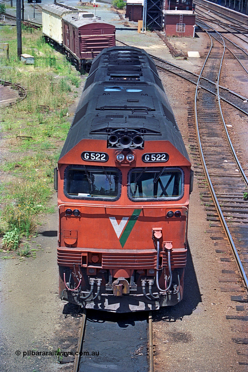 180-17
Albury, NSW, loco depot, V/Line standard gauge G class locomotive G 522 Clyde Engineering EMD model JT26C-2SS serial 86-1235 rests between jobs, elevated vertical view.
Keywords: G-class;G522;Clyde-Engineering-Rosewater-SA;EMD;JT26C-2SS;86-1235;