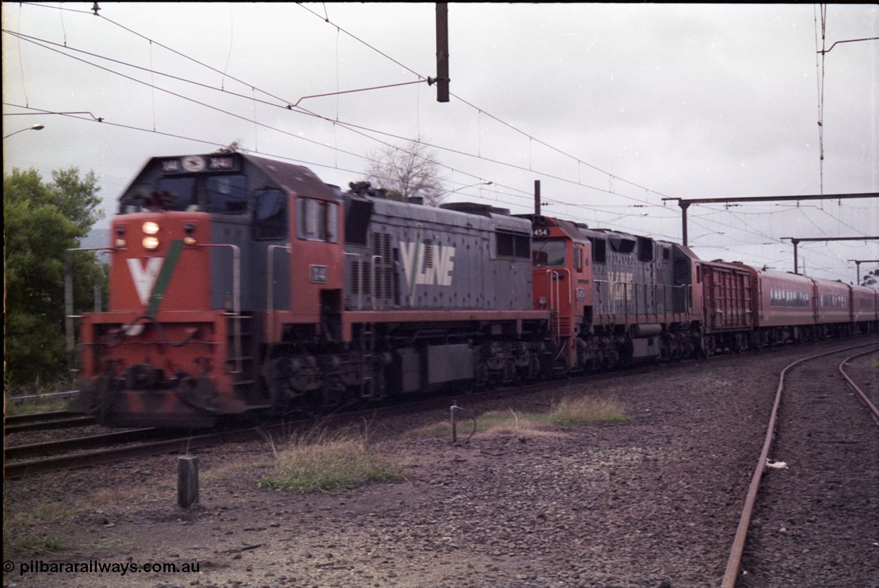 181-10
Trafalgar yard, broad gauge V/Line X class X 44 Clyde Engineering EMD model G26C serial 70-707 and N class N 454 'City of Horsham' Clyde Engineering EMD model JT22HC-2 serial 85-1222 hurry through with a down pass with D van and N set.
Keywords: X-class;X44;Clyde-Engineering-Granville-NSW;EMD;G26C;70-707;