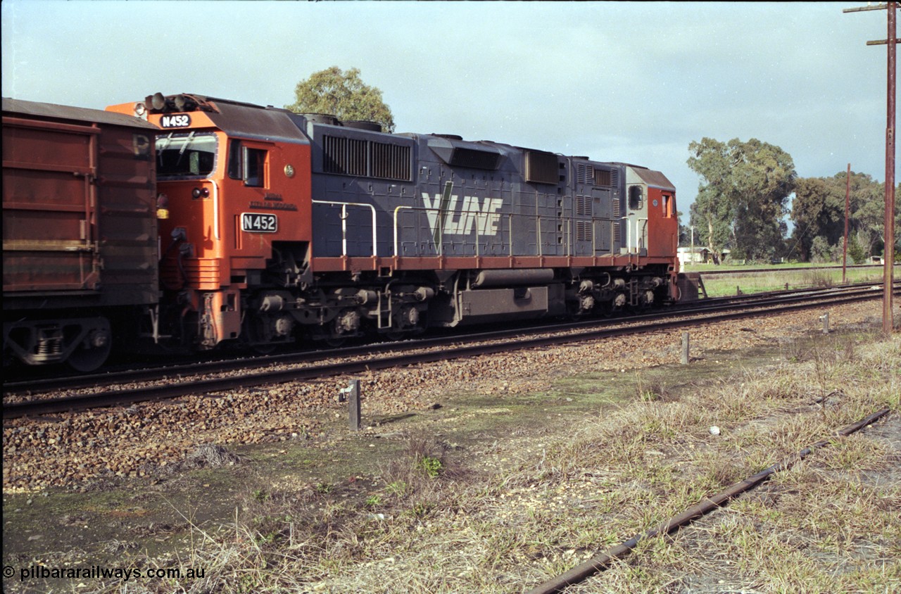 183-15
Violet Town, a V/Line broad gauge up Albury passenger train behind N class N 452 'Rural City of Wodonga' Clyde Engineering EMD model JT22HC-2 serial 85-1220 pauses at the platform, trailing view.
Keywords: N-class;N452;Clyde-Engineering-Somerton-Victoria;EMD;JT22HC-2;85-1220;