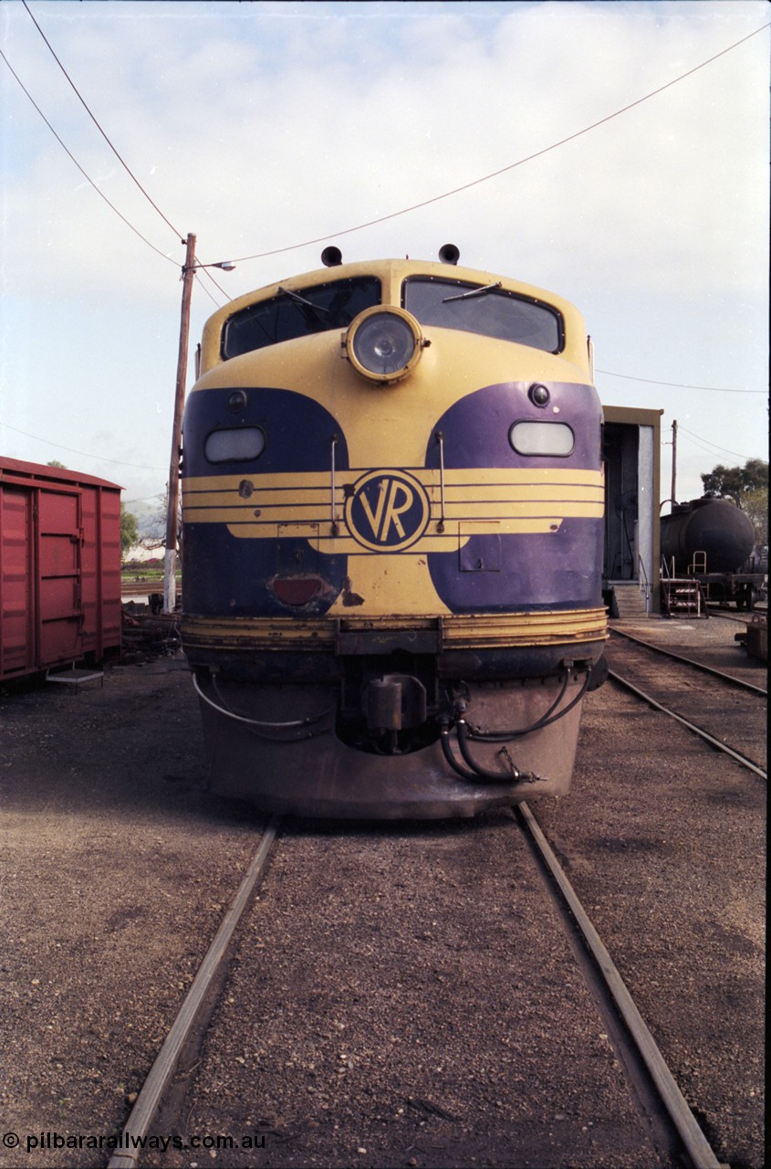 183-25
Wodonga loco depot fuel point, V/Line broad gauge Bulldog B class locomotive B 75 Clyde Engineering EMD model ML2 serial ML2-16 still in Victorian Railways livery, cab front view.
Keywords: B-class;B75;Clyde-Engineering-Granville-NSW;EMD;ML2;ML2-16;bulldog;