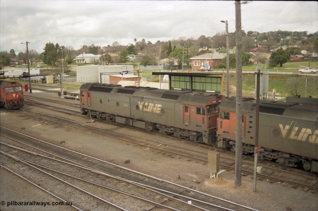 184-24
Albury loco depot, V/Line standard gauge G class G 520 Clyde Engineering EMD model JT26C-2SS serial 85-1233 receives attention at the fuel point, elevated view.
Keywords: G-class;G525;Clyde-Engineering-Rosewater-SA;EMD;JT26C-2SS;86-1238;