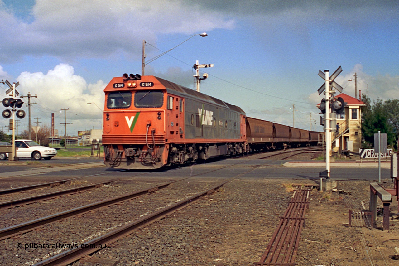 185-07
North Geelong C Box looking across the Separation Street grade crossing as a V/Line G class locomotive G 514 Clyde Engineering EMD model JT26C-2SS serial 85-1242 departs away from North Geelong Yard with 9121 empty grain train.
Keywords: G-class;G514;Clyde-Engineering-Rosewater-SA;EMD;JT26C-2SS;85-1242;