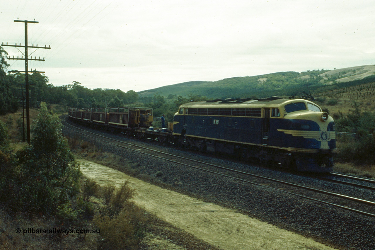 191-20
Kilmore East, Victorian Railways liveried B class B 65 Clyde Engineering EMD model ML2 serial ML2-6 leads an UP special sleeper discharge train as it discharges sleepers near the '37 mile' on a Sunday.
Keywords: B-class;B65;Clyde-Engineering-Granville-NSW;EMD;ML2;ML2-6;bulldog