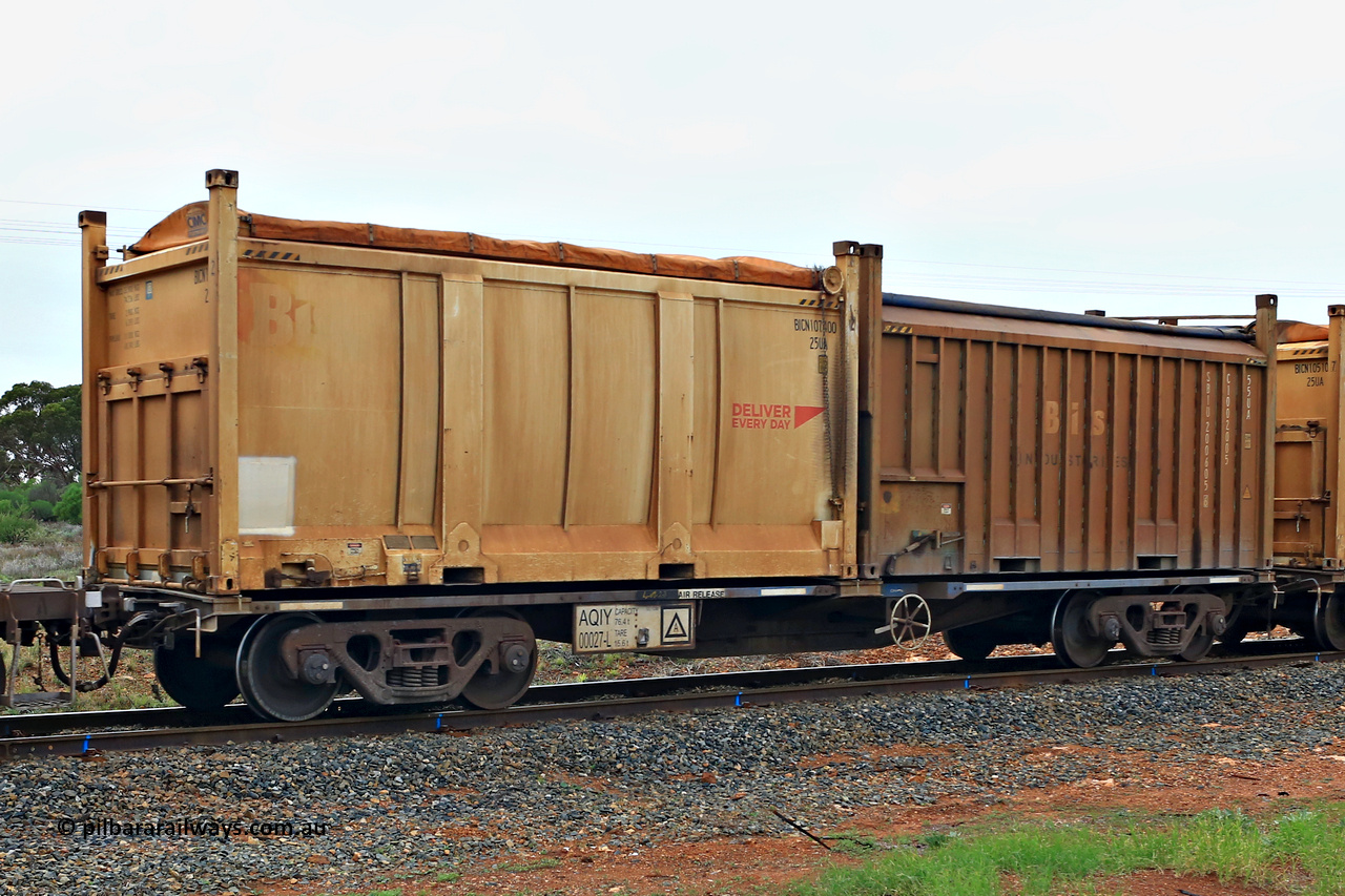 240401 4969
Kalgoorlie, Aurizon's 1029 Malcolm Freighter, waggon AQIY 00027 loaded with two 20' roll top containers, a 25UA type Bis Deliver Every Day BICN 107400[2] and a 55UA Bis Industries SBIU 200605[6]. The AQIY were originally built as the CQYY but CFCLA did not buy them, Bradken then stored them as KQYY. When Aurizon bought them they had the handbrake relocated to the middle of the waggon from the end. 1st of April 2024.
Keywords: AQIY-type;AQIY00027;Bradken;CQYY-type;KQYY-type;