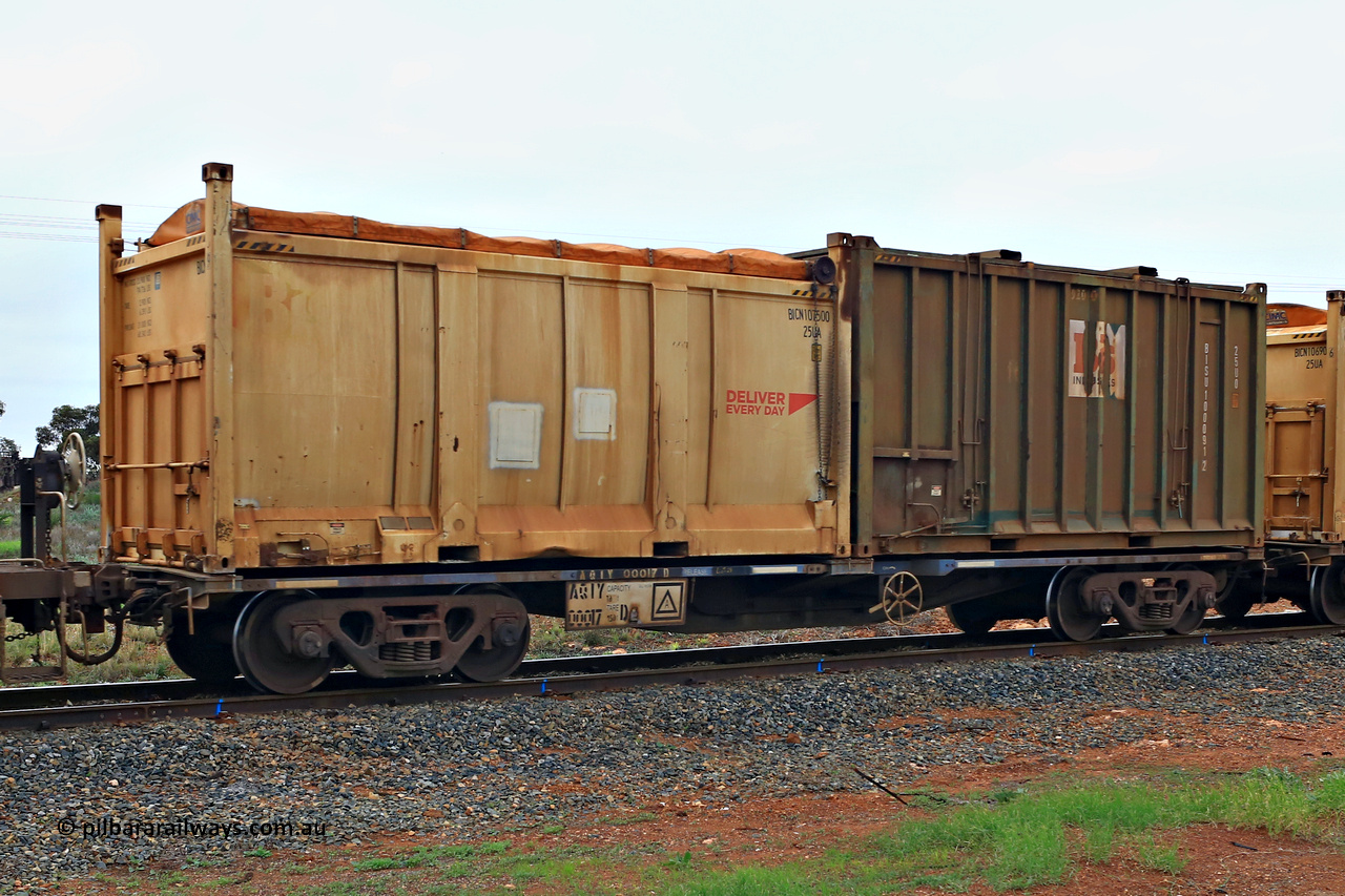 240401 4975
Kalgoorlie, Aurizon's 1029 Malcolm Freighter, waggon AQIY 00017 loaded with two 20 sulphur containers, a 25UA roll top Bis Deliver Every Day BICN 107500[9] and a 25U0 hard top Bis Industries BISU 100091[2]. The AQIY were originally built as the CQYY but CFCLA did not buy them, Bradken then stored them as KQYY. When Aurizon bought them they had the handbrake relocated to the middle of the waggon from the end. 1st of April 2024.
Keywords: AQIY-type;AQIY00017;Bradken;CQYY-type;KQYY-type;