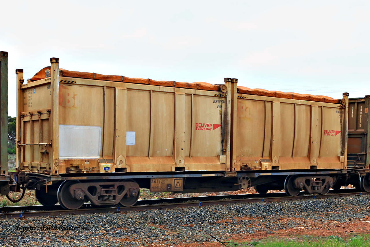 240401 4984
Kalgoorlie, Aurizon's 1029 Malcolm Freighter, waggon AQIY type leader AQIY 00001 loaded with two 20' 25UA type roll tops, Bis Deliver Every Day BICN 107800[8] and BICN 106100[5]. The AQIY were originally built as the CQYY but CFCLA did not buy them, Bradken then stored them as KQYY. When Aurizon bought them they had the handbrake relocated to the middle of the waggon from the end. 1st of April 2024.
Keywords: AQIY-type;AQIY00001;Bradken;CQYY-type;KQYY-type;