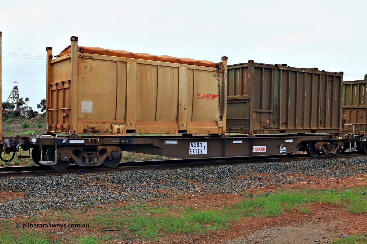 240401 4990
Kalgoorlie, Aurizon's 1029 Malcolm Freighter, waggon AQNY 32177, one of sixty two waggons built by Goninan WA in 1998 as the WQN type for Murrin Murrin container traffic loaded with two 20' sulphur containers, a Bis Deliver Every Day 25UA roll top BICN 105800[1] and a 25U0 type hard top BISU 100031[6]. 1st of April 2024.
Keywords: AQNY-type;AQNY32177;Goninan-WA;WQN-type;