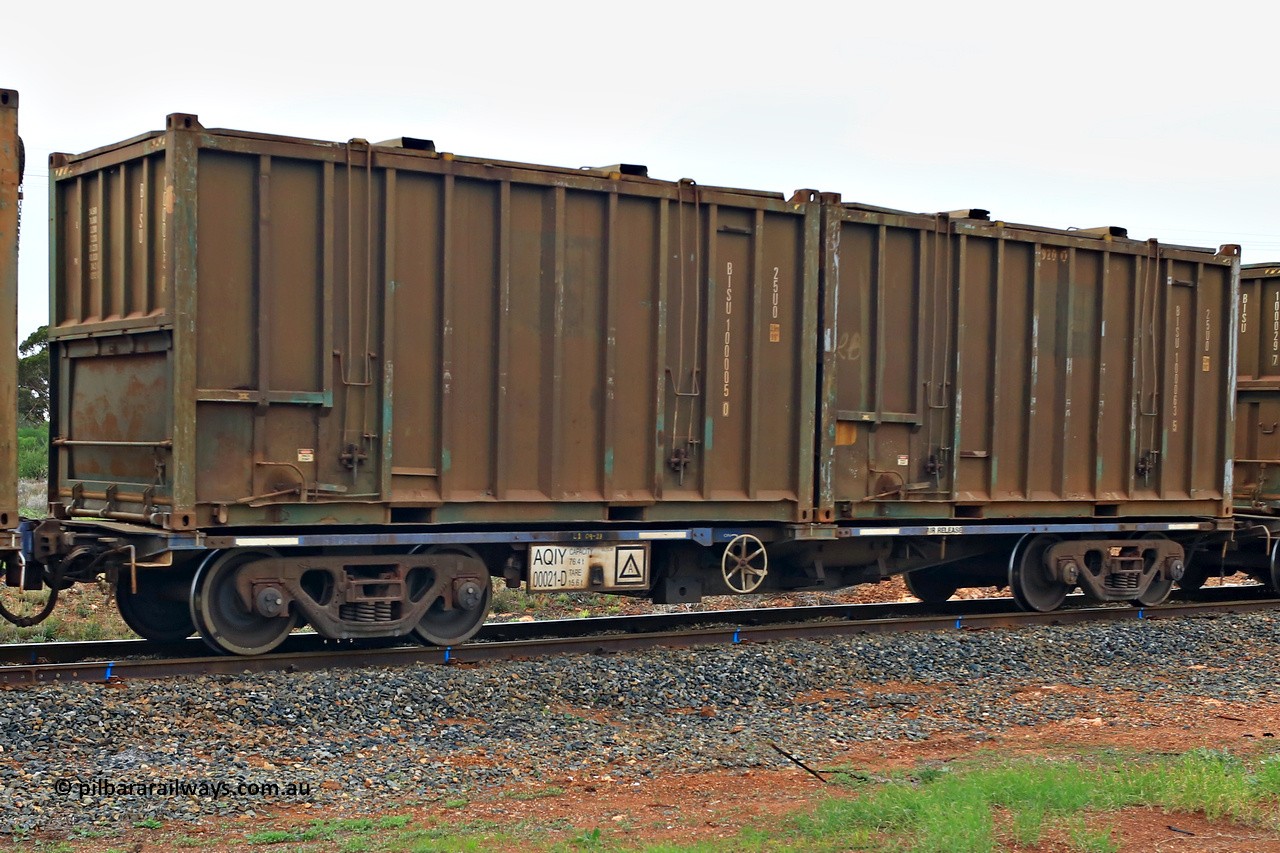 240401 4992
Kalgoorlie, Aurizon's 1029 Malcolm Freighter, waggon AQIY 00021 loaded with two 20' 25U0 type hard top sulphur containers BISU 100005[0] and BISU 100063[5]. The AQIY were originally built as the CQYY but CFCLA did not buy them, Bradken then stored them as KQYY. When Aurizon bought them they had the handbrake relocated to the middle of the waggon from the end. 1st of April 2024.
Keywords: AQIY-type;AQIY00021;Bradken;CQYY-type;KQYY-type;