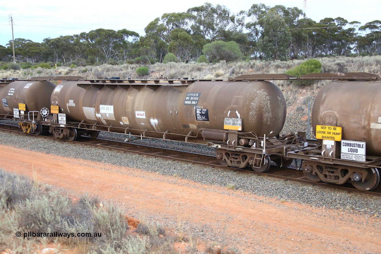 161116 5101
West Kalgoorlie, Shell fuel train 3442, tank waggon ATPF 575, built by WAGR Midland Workshops 1974 for Shell as type WJP 80.66 kL one compartment one dome.
Keywords: ATPF-type;ATPF575;WAGR-Midland-WS;WJP-type;