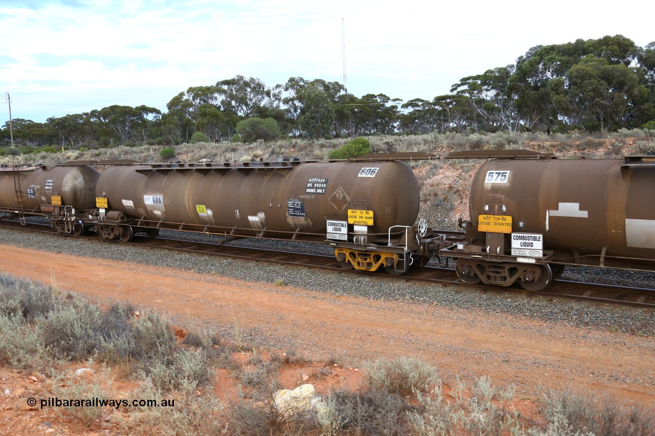 161116 5103
West Kalgoorlie, Shell fuel train 3442, tank waggon ATPF 606, built by Westrail Midland Workshops 1982 for Shell as type WJP 80.66 kL one compartment one dome.
Keywords: ATPF-type;ATPF606;Westrail-Midland-WS;WJP-type;