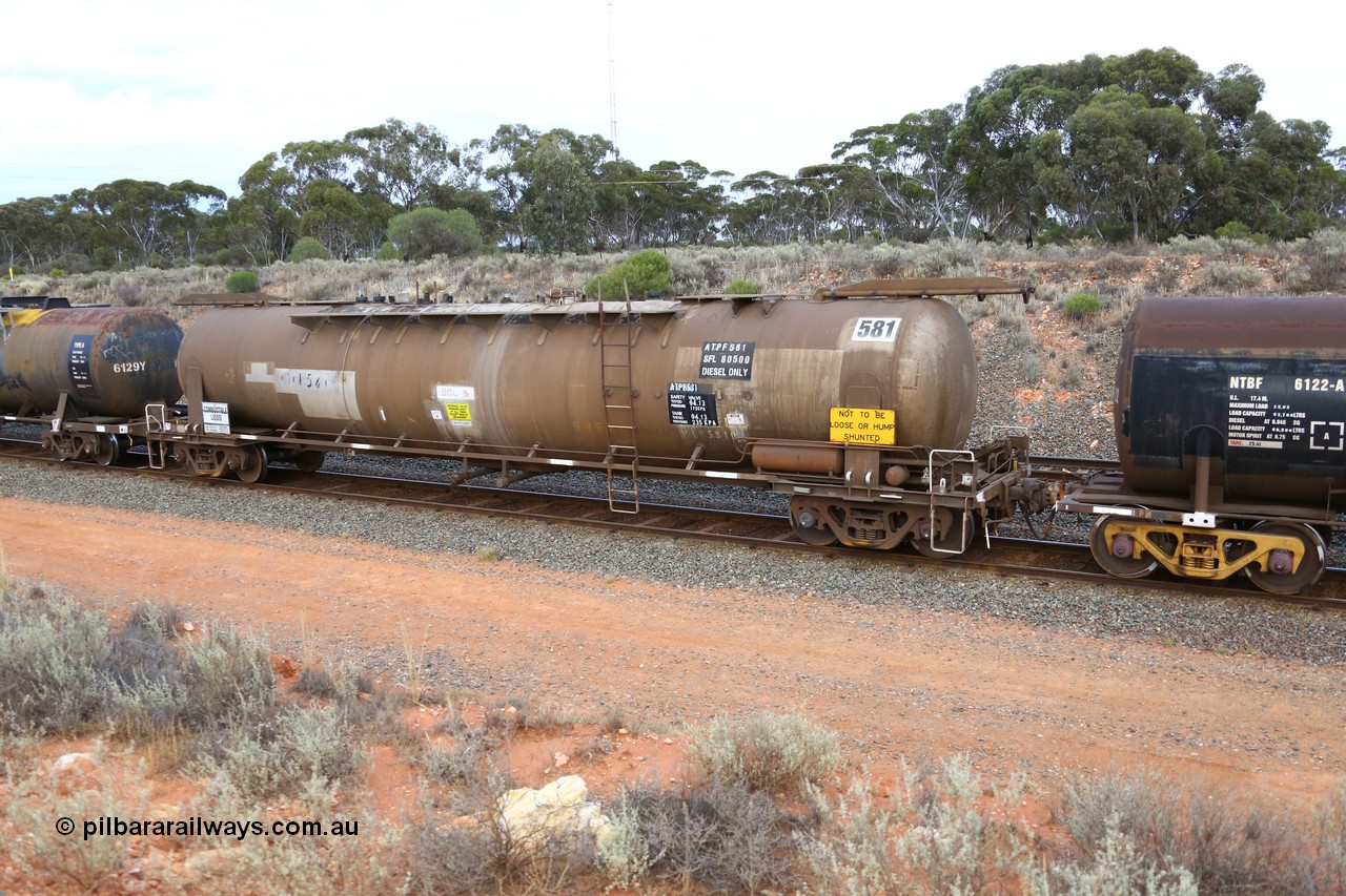 161116 5107
West Kalgoorlie, Shell fuel train 3442, ATPF type fuel tank waggon ATPF 581 built by WAGR Midland Workshops 1976 for Shell as type WJP 80.66 kL one compartment one dome, fitted with type F InterLock couplers, NTBF has standard E type.
Keywords: ATPF-type;ATPF581;WAGR-Midland-WS;WJP-type;JPC-type;