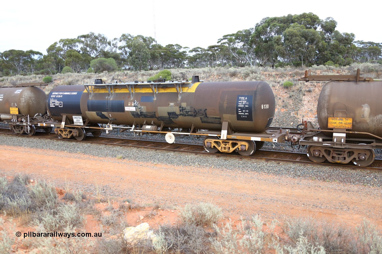 161116 5110
West Kalgoorlie, Shell fuel train 3442, tank waggon NTAY 6130, built by Indeng Qld 1979 for Shell as type SCA 281, later NTAF 281, note normal E type coupler, ATBY has type F InterLock and vacuum hose.
Keywords: NTAY-type;NTAY6130;Indeng-Qld;SCA-type;SCA281;