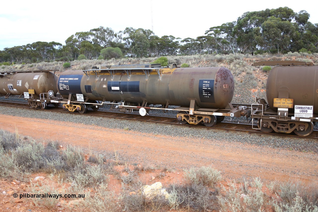 161116 5120
West Kalgoorlie, Shell fuel train 3442, tank waggon NTAY 6128, built by Indeng Qld 1976 for Shell as type SCA 279, then NTAF 279 with normal couplers.
Keywords: NTAY-type;NTAY6128;Indeng-Qld;SCA-type;SCA279;NTAF-type;