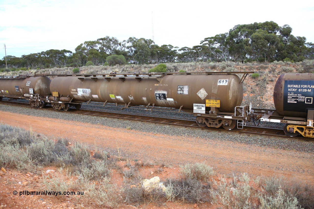 161116 5121
West Kalgoorlie, Shell fuel train 3442, ATQF type tank waggon ATQF 612, built by Indeng Qld 1982 for Shell as type WJQ, 73.34 kL one compartment one dome, Shell Fleet no. TR721, fitted with type F InterLock couplers.
Keywords: ATQF-type;ATQF612;Indeng-Qld;WJQ-type;