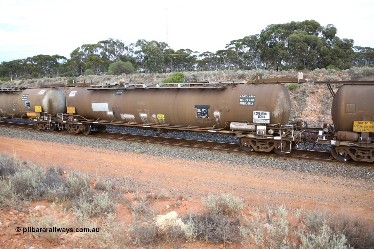 161116 5122
West Kalgoorlie, Shell fuel train 3442, tank waggon ATBY 14594, built by Westrail Midland Workshops 1981 for Bain Leasing as narrow gauge type JPB, to SG as WPJB then WJBY, 82 kL one compartment one dome, fitted with type F InterLock couplers, vacuum brake pipe, Shell Fleet no. TR728.
Keywords: ATBY-type;ATBY14594;Westrail-Midland-WS;JPB-type;JPBA-type;WJPB-type;