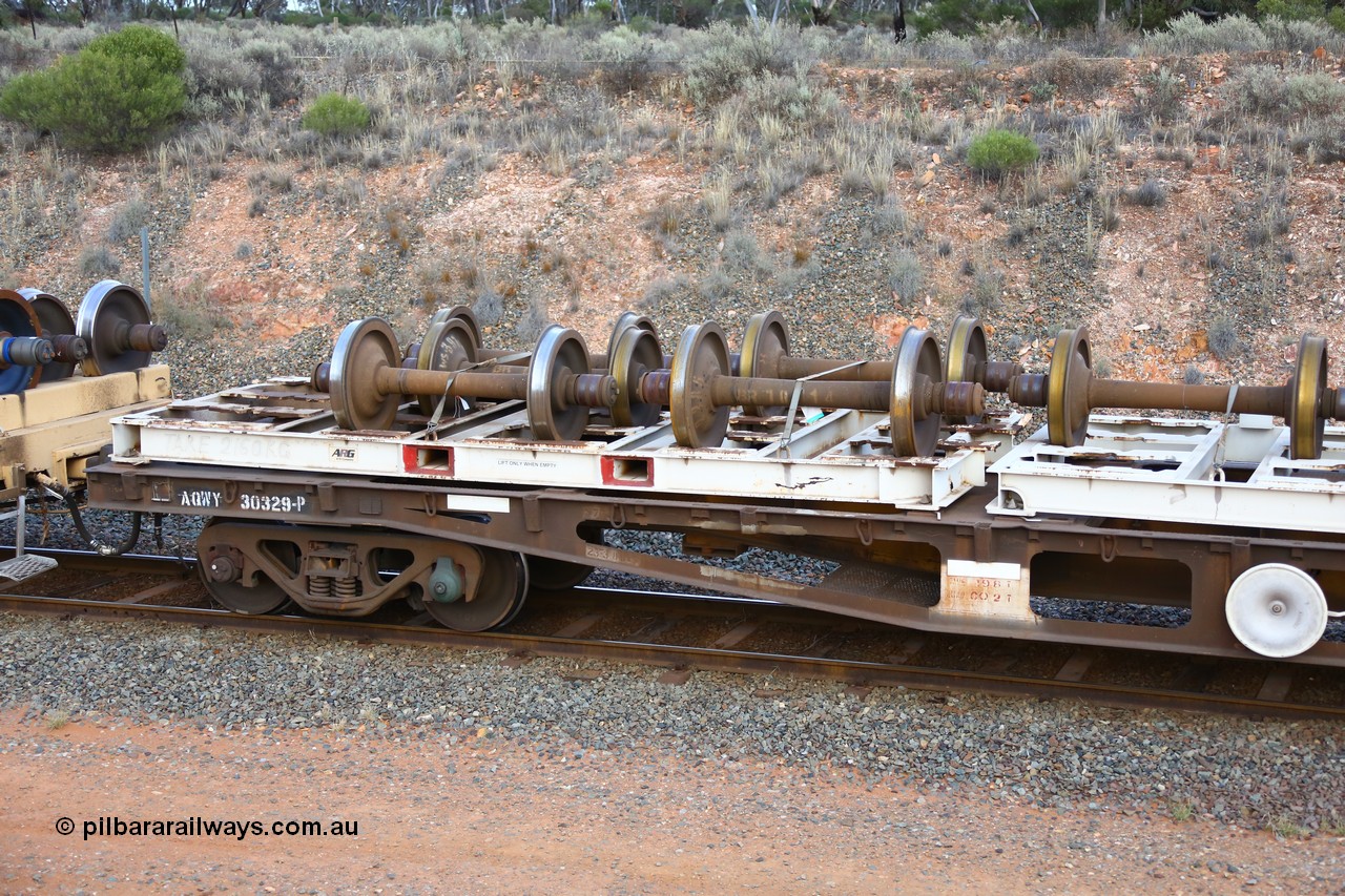 161116 5131
West Kalgoorlie, Shell fuel train 3442, container flat waggon AQWY 30329, built by Tomlinson Steel WA in a batch of 161 WFX type waggons between 1969 and 1970. Fitted with three 20' wheel set carrying frames.
Keywords: AQWY-type;AQWY30329;Tomlinson-Steel-WA;WFX-type;