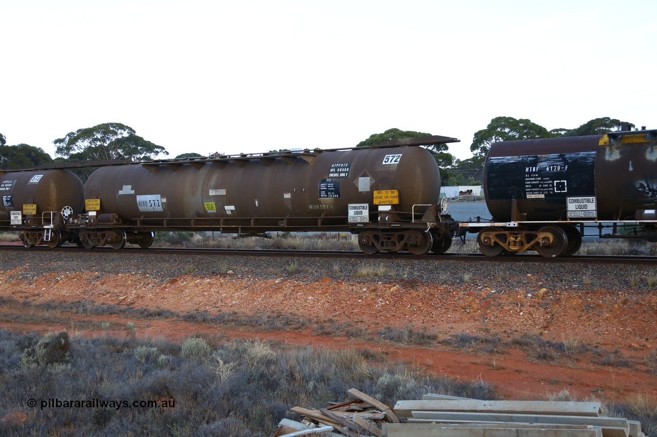 161116 5550
Binduli, empty Shell fuel train 4443, ATPF type tank waggon ATPF 572, built by WAGR Midland Workshops 1974 for Shell as WJP type 80.66 kL one compartment one dome, old code still visible, fitted with type F InterLock couplers.
Keywords: ATPF-type;ATPF572;WAGR-Midland-WS;WJP-type;