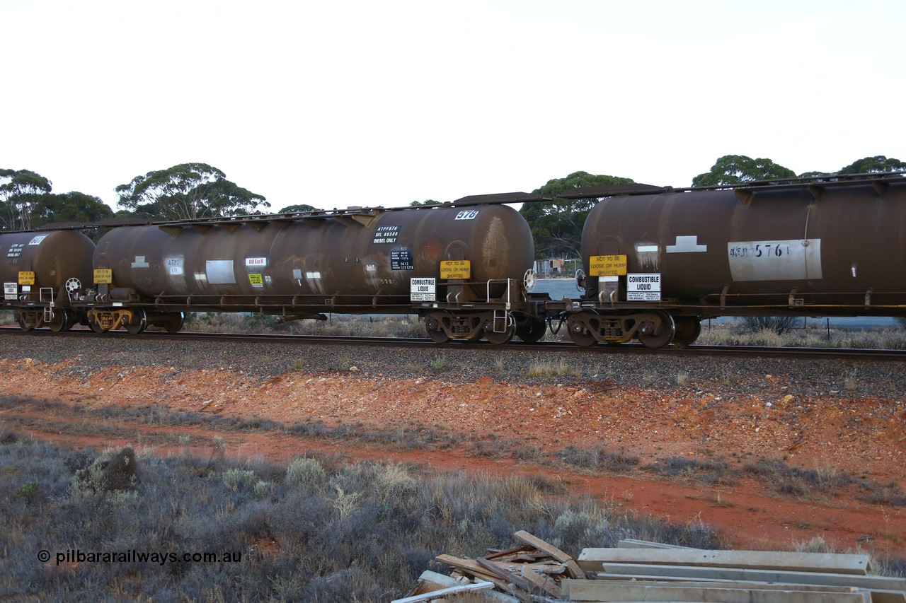 161116 5556
Binduli, empty Shell fuel train 4443, ATPF type fuel tank waggon ATPF 578, originally built by WAGR Midland Workshops in 1974 for Shell as type WJP 80.66 kL one compartment one dome, it also spent time in SA in 1985. Capacity now 80,350 litres, fitted with type F InterLock couplers.
Keywords: ATPF-type;ATPF578;WAGR-Midland-WS;WJP-type;
