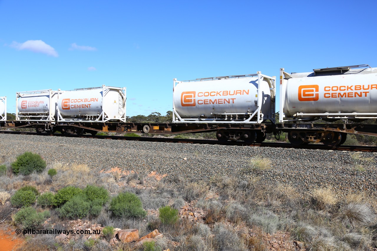 161111 2456
Binduli, Kalgoorlie Freighter train 5025, AQWY 30348 container waggon, originally built by Tomlinson Steel WA as WFX type in 1970 from a batch of one hundred and sixty one waggons, to narrow gauge as QWF type in 1970, back to SG in 1972 as WFX, recoded in 1979 to WQCX type. Loaded with two Cockburn Cement Convair type 20' tanktainers 1109 and 1108.
Keywords: AQWY-type;AQWY30348;Tomlinson-Steel-WA;WFX-type;QWF-type;WQCX-type;