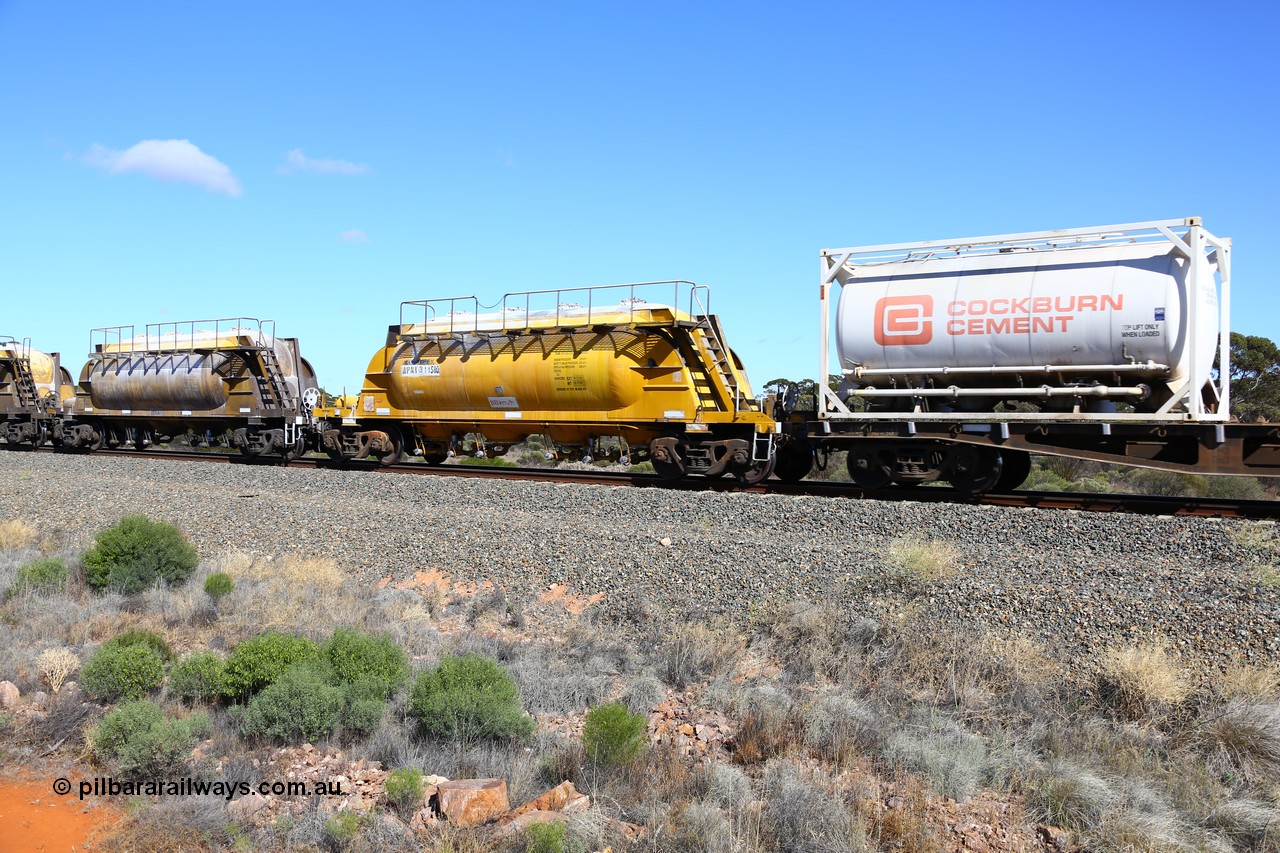 161111 2458
Binduli, Kalgoorlie Freighter train 5025, waggon APNY 31158, one of twelve built by WAGR Midland Workshops in 1974 as WNA type pneumatic discharge nickel concentrate waggon, WAGR built and owned copies of the AE Goodwin built WN waggons for WMC.
Keywords: APNY-type;APNY31158;WAGR-Midland-WS;WNA-type;