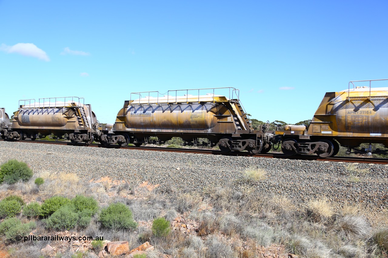 161111 2460
Binduli, Kalgoorlie Freighter train 5025, waggon APNY 31156, one of twelve built by WAGR Midland Workshops in 1974 as WNA type pneumatic discharge nickel concentrate waggon, WAGR built and owned copies of the AE Goodwin built WN waggons for WMC.
Keywords: APNY-type;APNY31156;WAGR-Midland-WS;WNA-type;