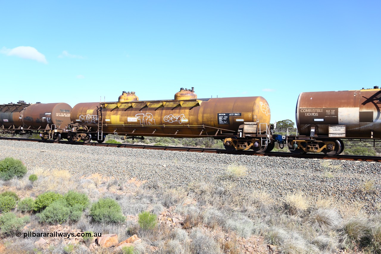161111 2471
Binduli, Kalgoorlie Freighter train 5025, diesel fuel tank waggon ATTY 30673, one of five built by AE Goodwin NSW in 1970 as WST class, recoded to WSTY and then ATTY. 78600 litre capacity.
Keywords: ATTY-type;ATTY30673;AE-Goodwin;WST-type;WSTY-type;