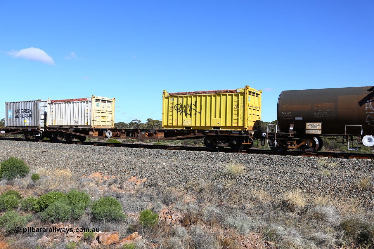161111 2483
Binduli, Kalgoorlie Freighter train 5025, container flat waggon AQWY 31024, built by Centrecon Ltd WA in 1981 in a batch of thirty five WFA type container waggons, another eighteen were also built by Westrail. In 1987 it was converted to WFAP for motor vehicle transport, loaded here with two 20' 2CU0 type roll top containers CODU 006128[8] and CODU 006123[0], both with Aurizon decals.
Keywords: AQWY-type;AQWY31024;Centrecon-Ltd-WA;WFA-type;WFAP-type;