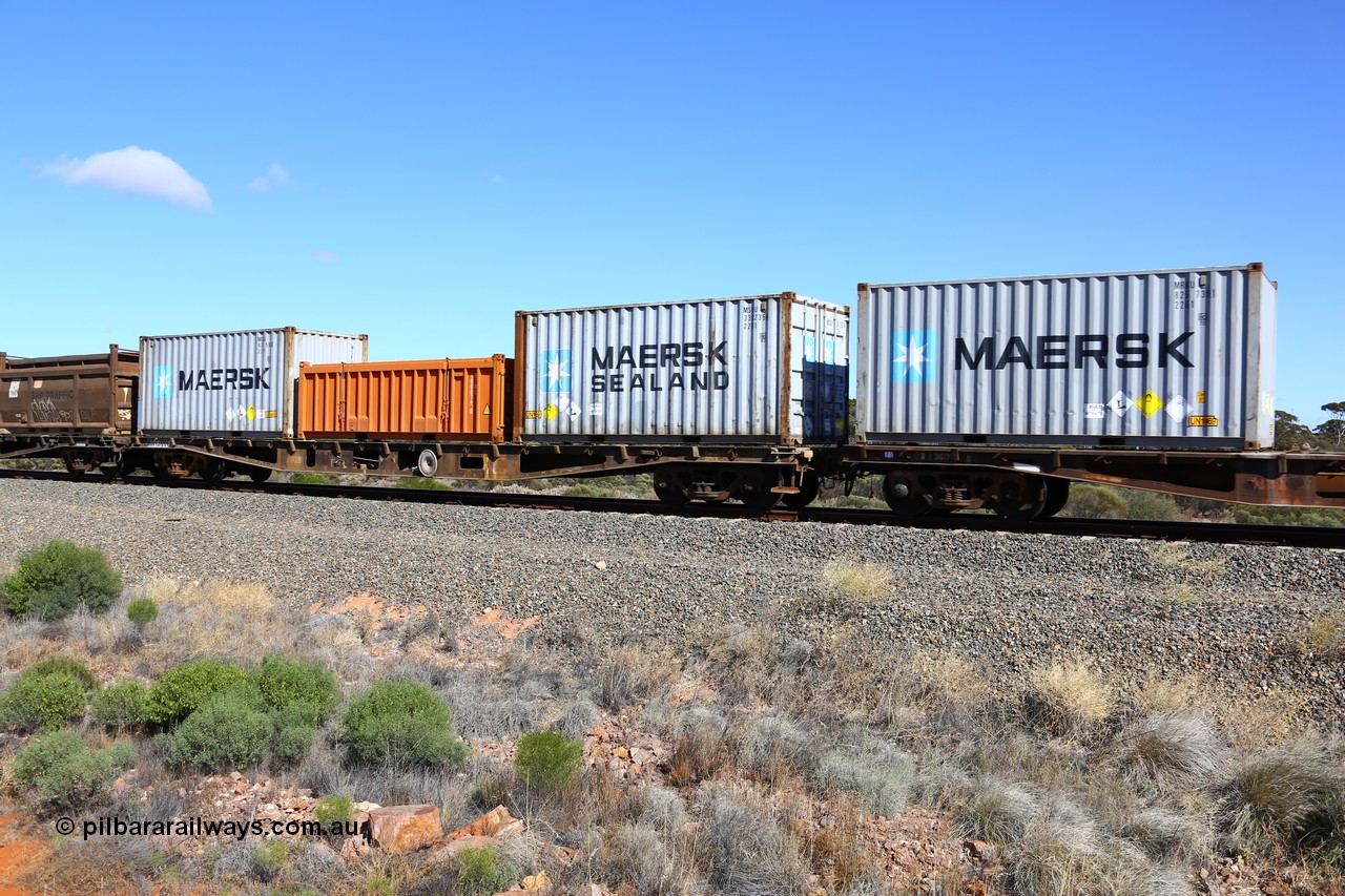 161111 2485
Binduli, Kalgoorlie Freighter train 5025, container flat waggon AQWY 31006, one of a batch of eighteen built by Westrail Midland Workshops in 1981 as WFA type, to WQCY type in 1987, to RHQY in 1994 then back to WQCY in 1995, seen here loaded with two 20' 22G1 type Maersk boxes for lead nitrate, MSKU 336235[4] and MSKU 438595[0] and a 20' half height box for Nickel West NIWU 100079[0] that normally contains quartz for the smelter.
Keywords: AQWY-type;AQWY31006;Westrail-Midland-WS;WFA-type;WQCY-type;