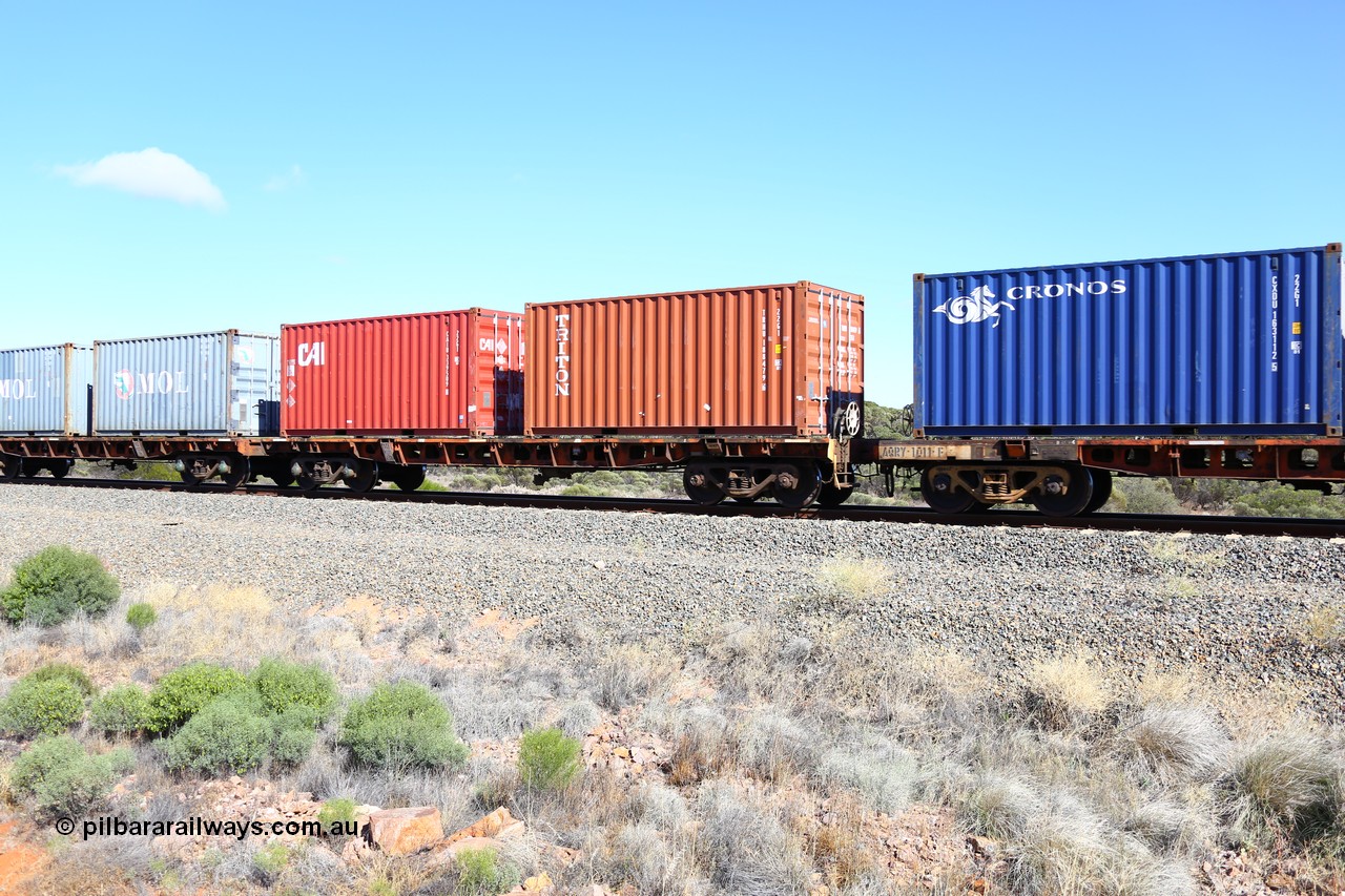 161111 2496
Binduli, Kalgoorlie Freighter train 5025, waggon AQRY 1001 platform B with two 20' 22G1 type boxes, a Triton TRHU 188479[6] and CAI CAIU 339509[8]. The AQRY are a bar-coupled pair and were used for rail transport as the AFRF type on the Darwin line and are originally former ANR-CR waggons.
Keywords: AQRY-type;AQRY1001;AFRF-type;