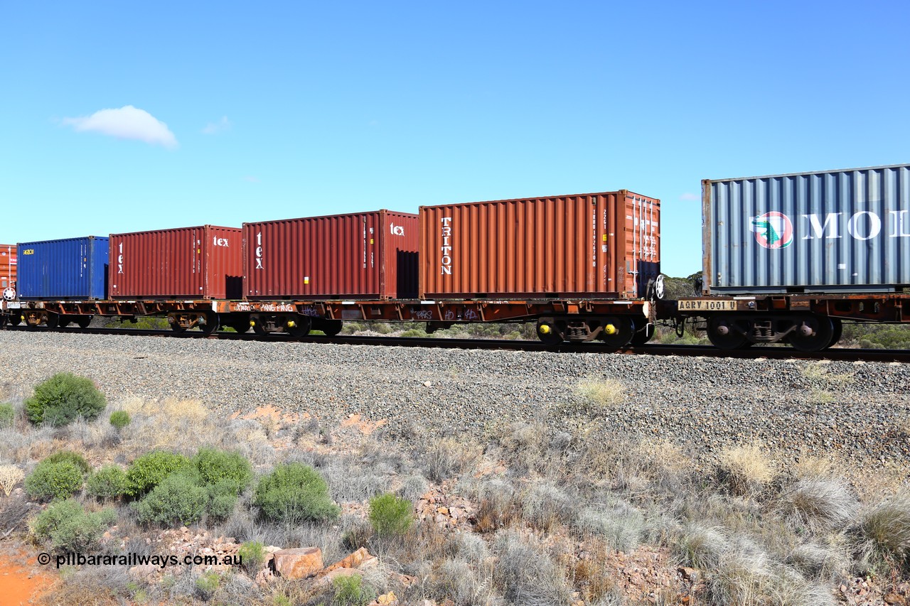 161111 2498
Binduli, Kalgoorlie Freighter train 5025, waggon AQRY 1023 platform B with two 20' 22G1 type boxes, Triton TRHU 192670[0] and Tex TEMU 511658[1]. The AQRY are a bar-coupled pair and were used for rail transport as the AFRF type on the Darwin line and are originally former ANR-CR waggons.
Keywords: AQRY-type;AQRY1023;AFRF-type;