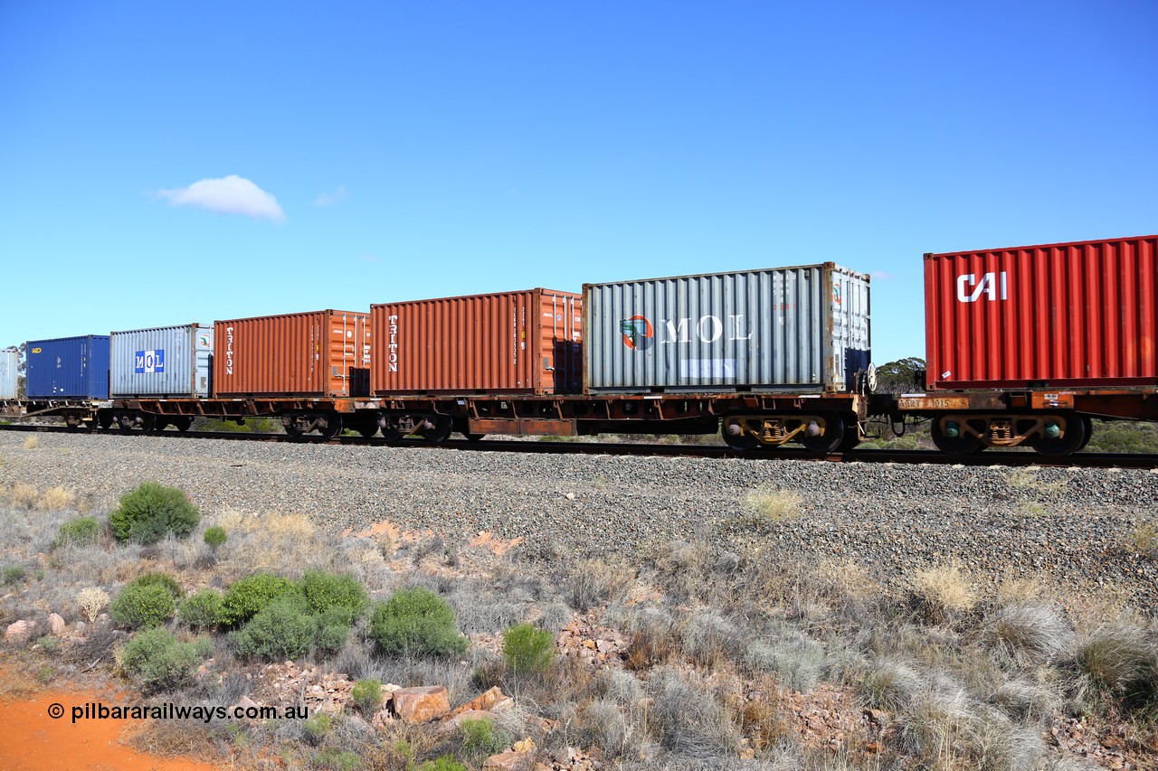 161111 2501
Binduli, Kalgoorlie Freighter train 5025, waggon AQRY 1004 platforms A and B loaded with four 20' 22G1 type boxes, MOL MOAU 066599[8], Triton TCKU 203535[2], Triton TCKU 392829[9] and MOL MOAU 772234[3]. The AQRY are a bar-coupled pair and were used for rail transport as the AFRF type on the Darwin line and are originally former ANR-CR waggons.
Keywords: AQRY-type;AQRY1004;AFRF-type;