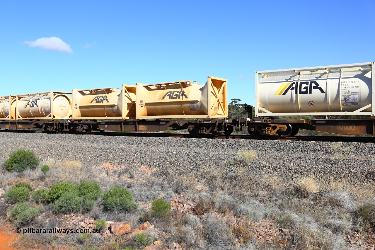 161111 2505
Binduli, Kalgoorlie Freighter train 5025, waggon AQNY 32182 one of sixty two waggons built by Goninan WA in 1998 as WQN type for Murrin Murrin container traffic, carrying two AGR 20' tanks V0687 and V0688 containing sodium cyanide solution.
Keywords: AQNY-type;AQNY32182;Goninan-WA;WQN-type;