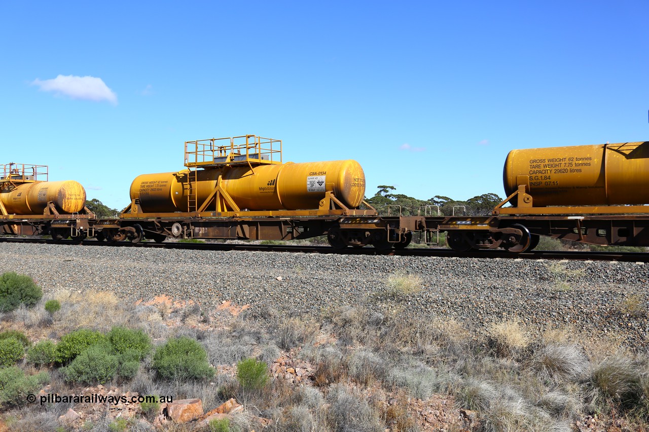 161111 2518
Binduli, Kalgoorlie Freighter train 5025, waggon AQHY 30011 with sulphuric acid tank CSA 0134, originally built by the WAGR Midland Workshops in 1964/66 as a WF type flat waggon, then in 1997, following several recodes and modifications, was one of seventy five waggons converted to the WQH type to carry CSA sulphuric acid tanks between Hampton/Kalgoorlie and Perth/Kwinana.
Keywords: AQHY-type;AQHY30011;WAGR-Midland-WS;WF-type;WFDY-type;WFDF-type;WQH-type;