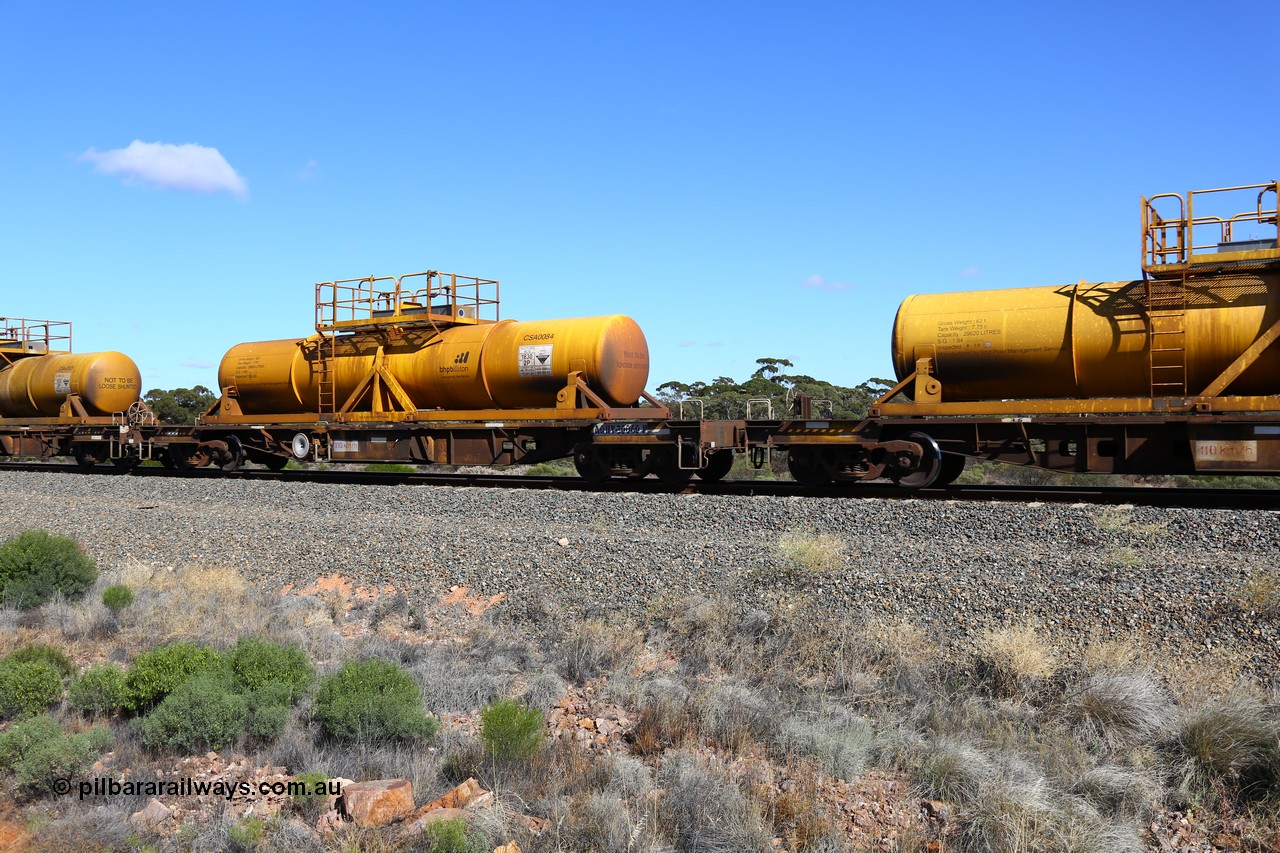 161111 2520
Binduli, Kalgoorlie Freighter train 5025, waggon AQHY 30060 with sulphuric acid tank CSA 0084, originally built by the WAGR Midland Workshops in 1964/66 as a WF type flat waggon, then in 1997, following several recodes and modifications, was one of seventy five waggons converted to the WQH type to carry CSA sulphuric acid tanks between Hampton/Kalgoorlie and Perth/Kwinana.
Keywords: AQHY-type;AQHY30060;WAGR-Midland-WS;WF-type;WFL-type;WFDY-type;WFDF-type;RFDF-type;WQH-type;